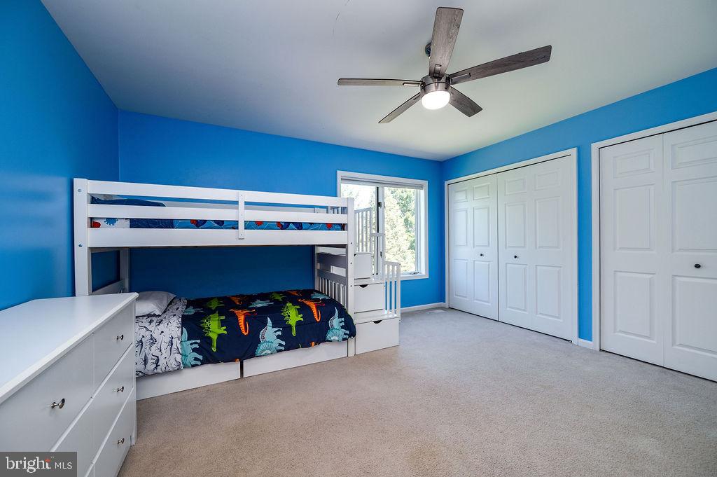 24 Sycamore Drive Reading, PA 19606 - Photo 38 of 56 a bedroom with a bed and a ceiling fan