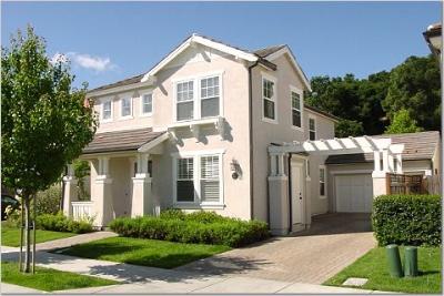 27 Alconbury Way Novato, CA 94949 - Photo 1 of 10 a front view of a house with a yard and garage
