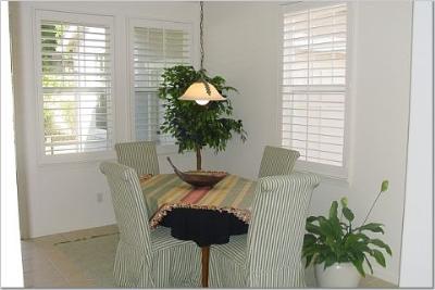 27 Alconbury Way Novato, CA 94949 - Photo 5 of 10 a bedroom with a bed and a potted plant