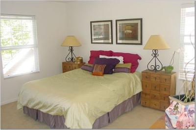 27 Alconbury Way Novato, CA 94949 - Photo 7 of 10 a bed sitting in a bedroom next to a window