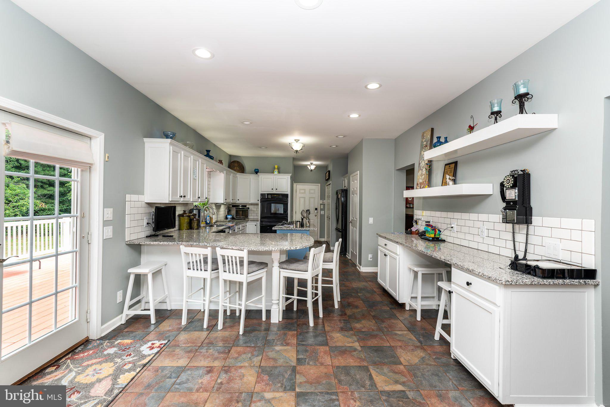 309 East Weymouth Road Newfield, NJ 08344 - Photo 4 of 10 Bright and airy modern kitchen space.