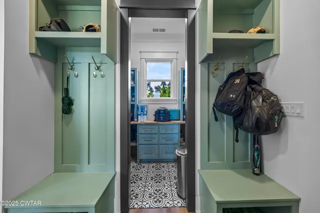 a living room with furniture fireplace and flat screen tv