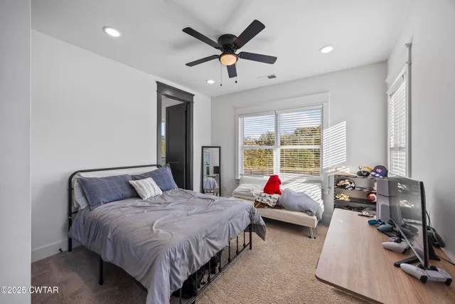 a view of swimming pool with a yard