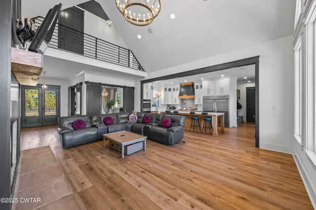 a kitchen with a table and chairs in it