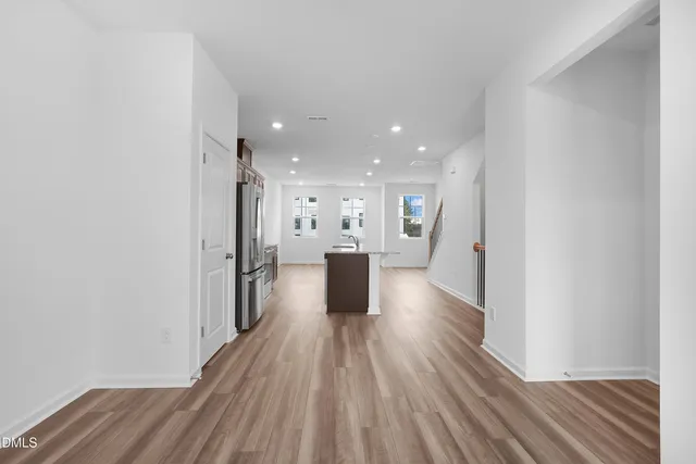 a view of kitchen with wooden floor