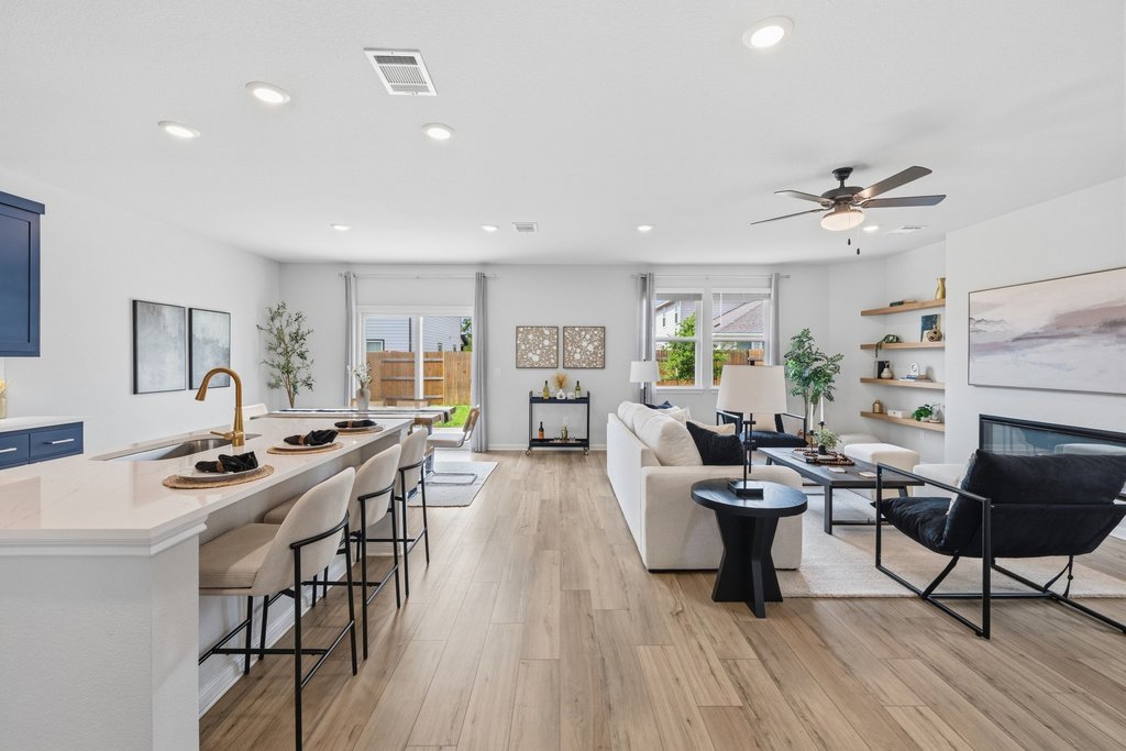 8001 Andravida Drive Austin, TX 78747 - Photo 16 of 35 Open-concept living filled with natural light and designed for effortless entertaining
