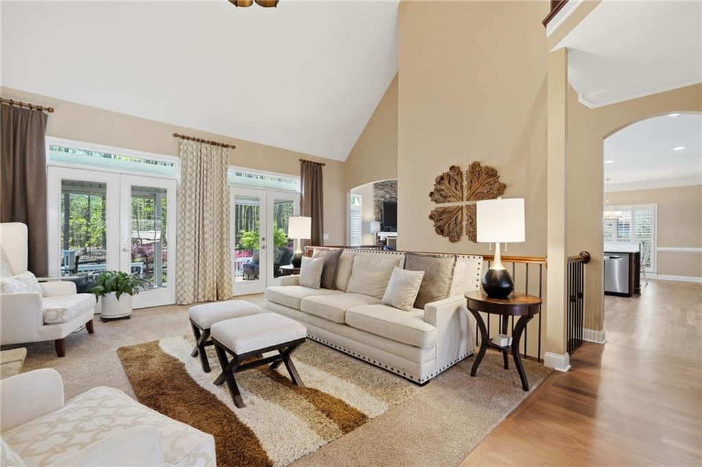 4147 Gold Mill Ridge Canton, GA 30114 - Photo 11 of 93 a living room with furniture and wooden floor