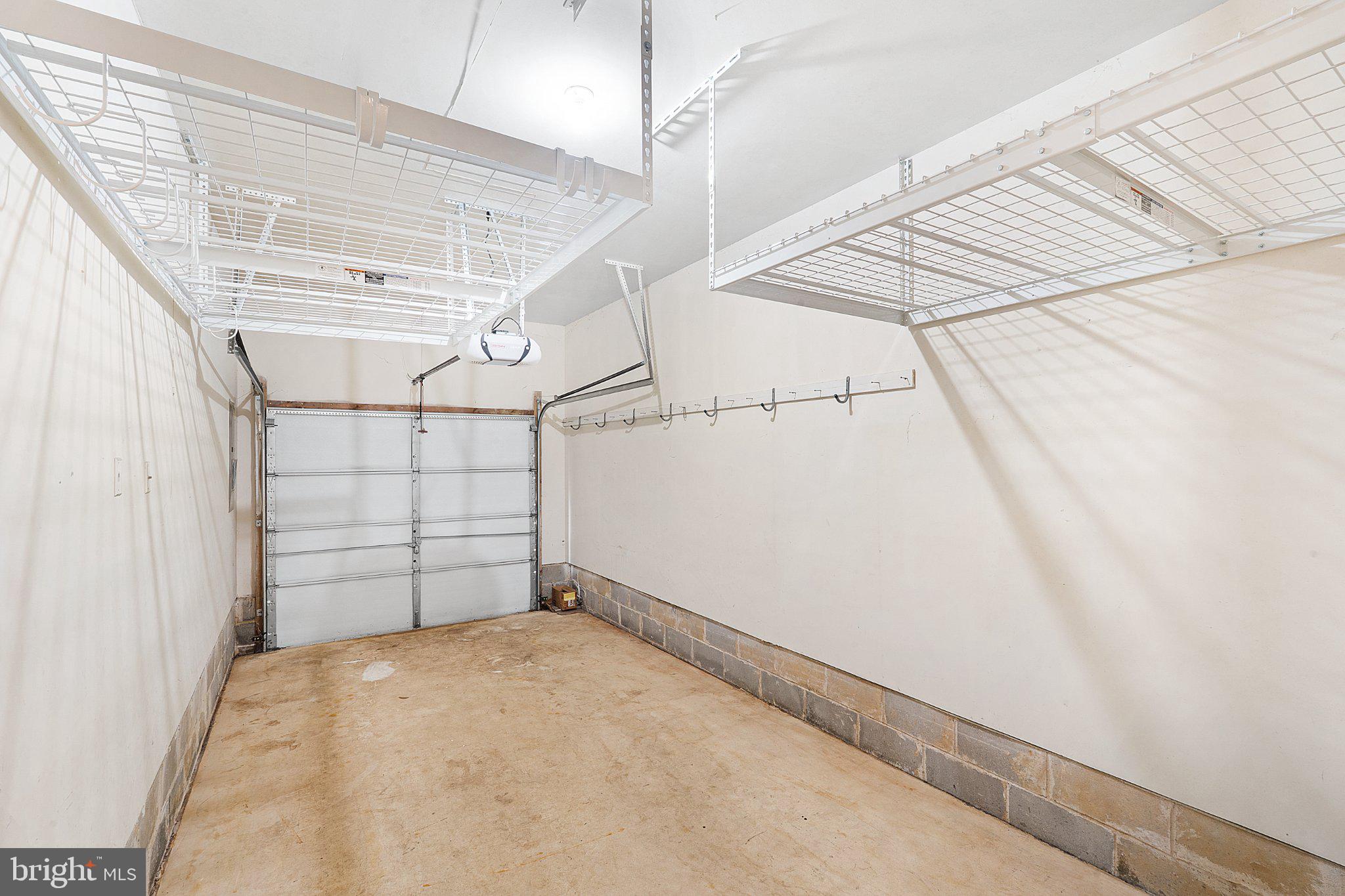 99 Warwick Road Princeton Junction, NJ 08550 - Photo 12 of 35 Spacious garage with ample storage.