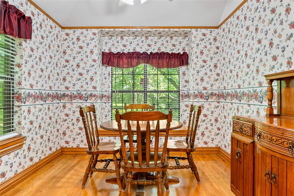 3650 Mt Zion Road Midlothian, TX 76065 - Photo 11 of 38 Kitchen area is about 10 x 10 and has wonderful windows to see the natural beauty of the land and trees.