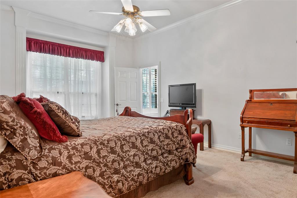 3650 Mt Zion Road Midlothian, TX 76065 - Photo 13 of 38 View of primary bedroom from opposite side of the room. The window faces that back porch and the fenced in area of the backyard.