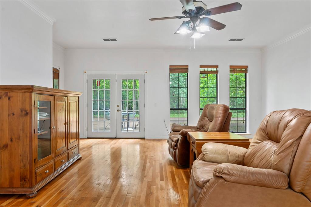 3650 Mt Zion Road Midlothian, TX 76065 - Photo 21 of 38 Game room with windows on the north and south side of the room. The windows that face north lookout to the backyard, and the windows on the southside look out to the driveway area.