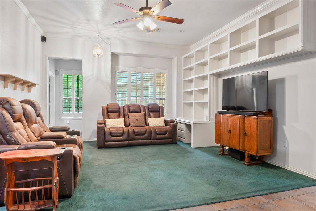 3650 Mt Zion Road Midlothian, TX 76065 - Photo 8 of 38 Living room that is approximately 14 x 18 with wooden built ins.