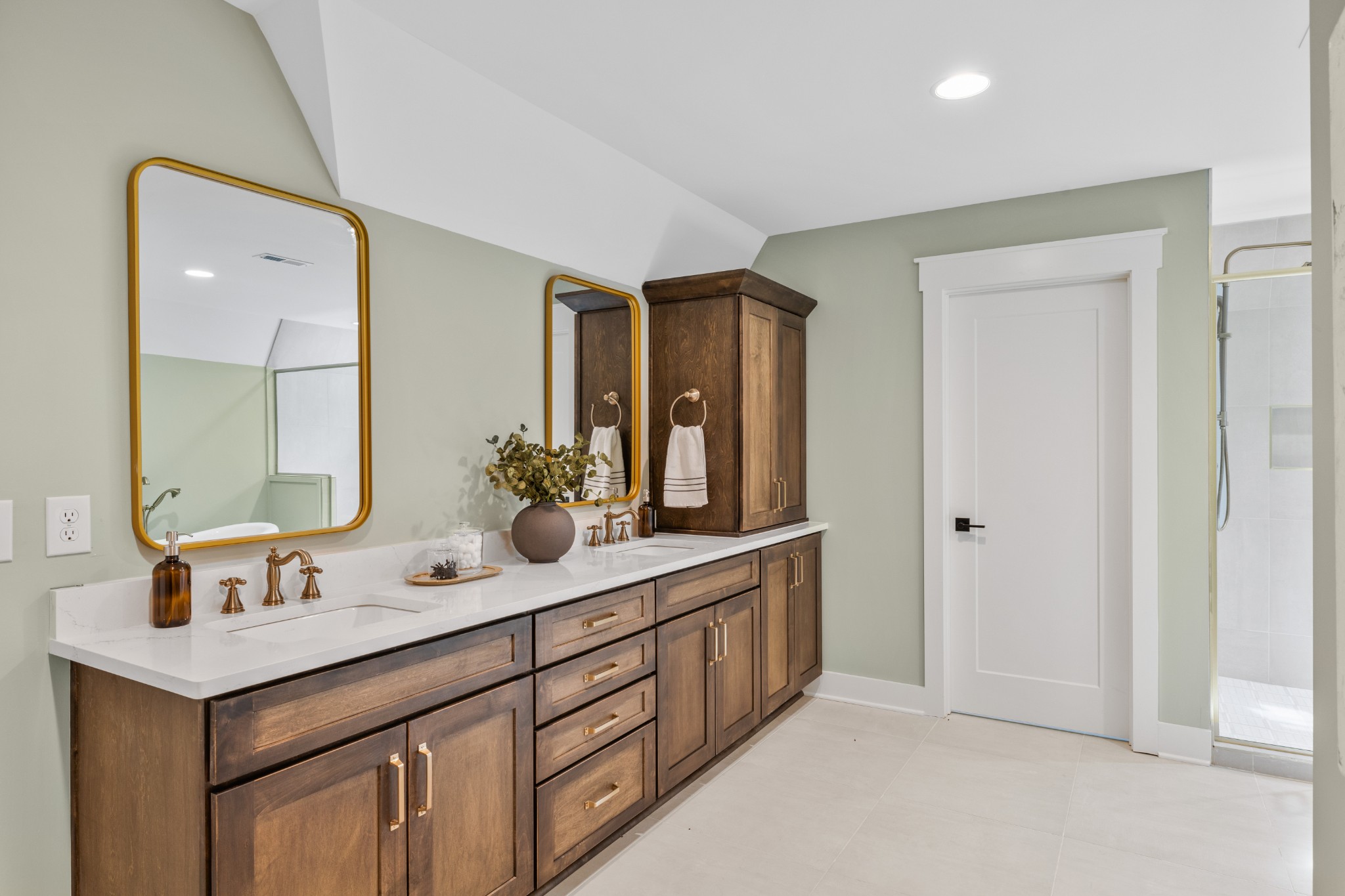 4366 Chickering Lane Nashville, TN 37215 - Photo 14 of 32 a bathroom with a double vanity sink and mirror