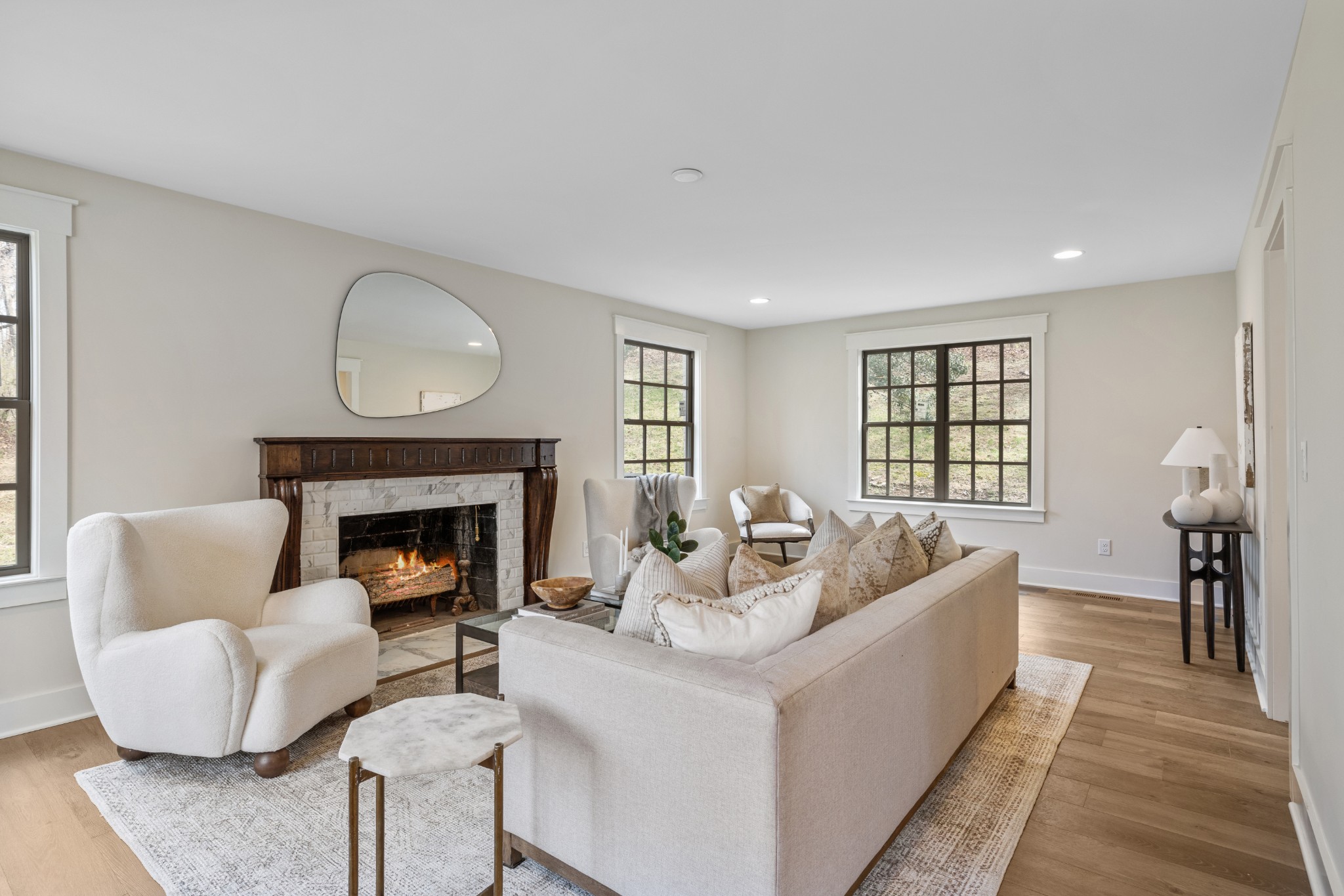 4366 Chickering Lane Nashville, TN 37215 - Photo 17 of 32 a living room with furniture and a fireplace