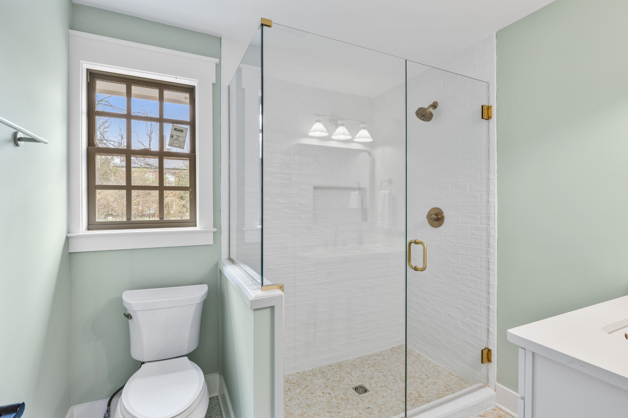 4366 Chickering Lane Nashville, TN 37215 - Photo 19 of 32 a bathroom with a toilet and shower