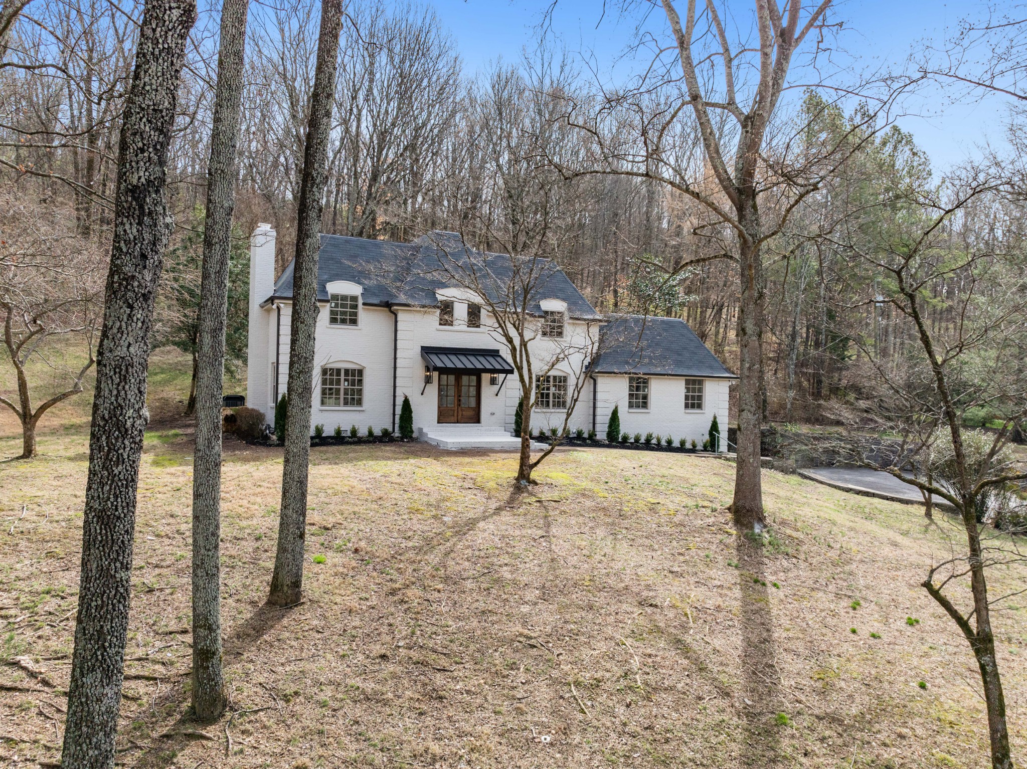 4366 Chickering Lane Nashville, TN 37215 - Photo 28 of 32 a house that has a tree in front of it