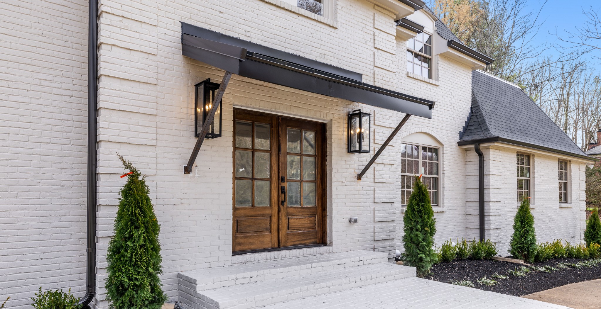 4366 Chickering Lane Nashville, TN 37215 - Photo 3 of 32 a front view of a house with a yard