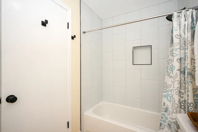 a bathroom with a bathtub