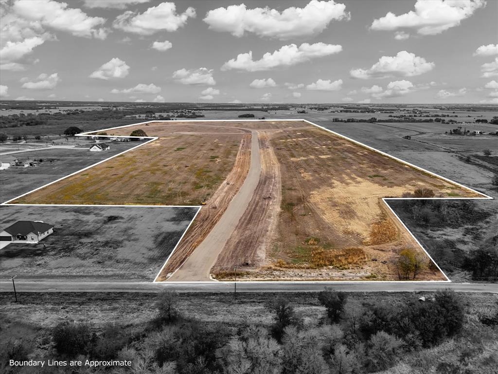 Lot 22 High Meadow Road Elm Mott, TX 76640 - Photo 4 of 12 a view of a swimming pool with a yard