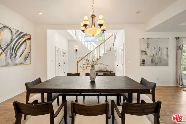 a living room with furniture fireplace and window