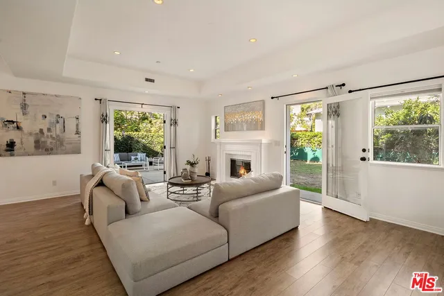 a kitchen with granite countertop counter top space a sink stainless steel appliances and cabinets