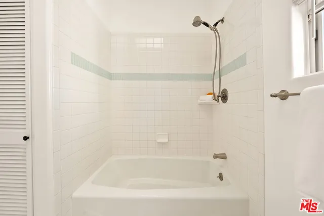 a view of backyard with outdoor seating and plants