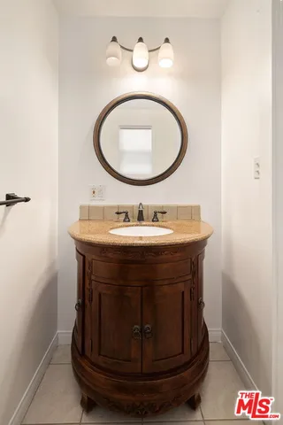 a view of a dining area with furniture and chandelier