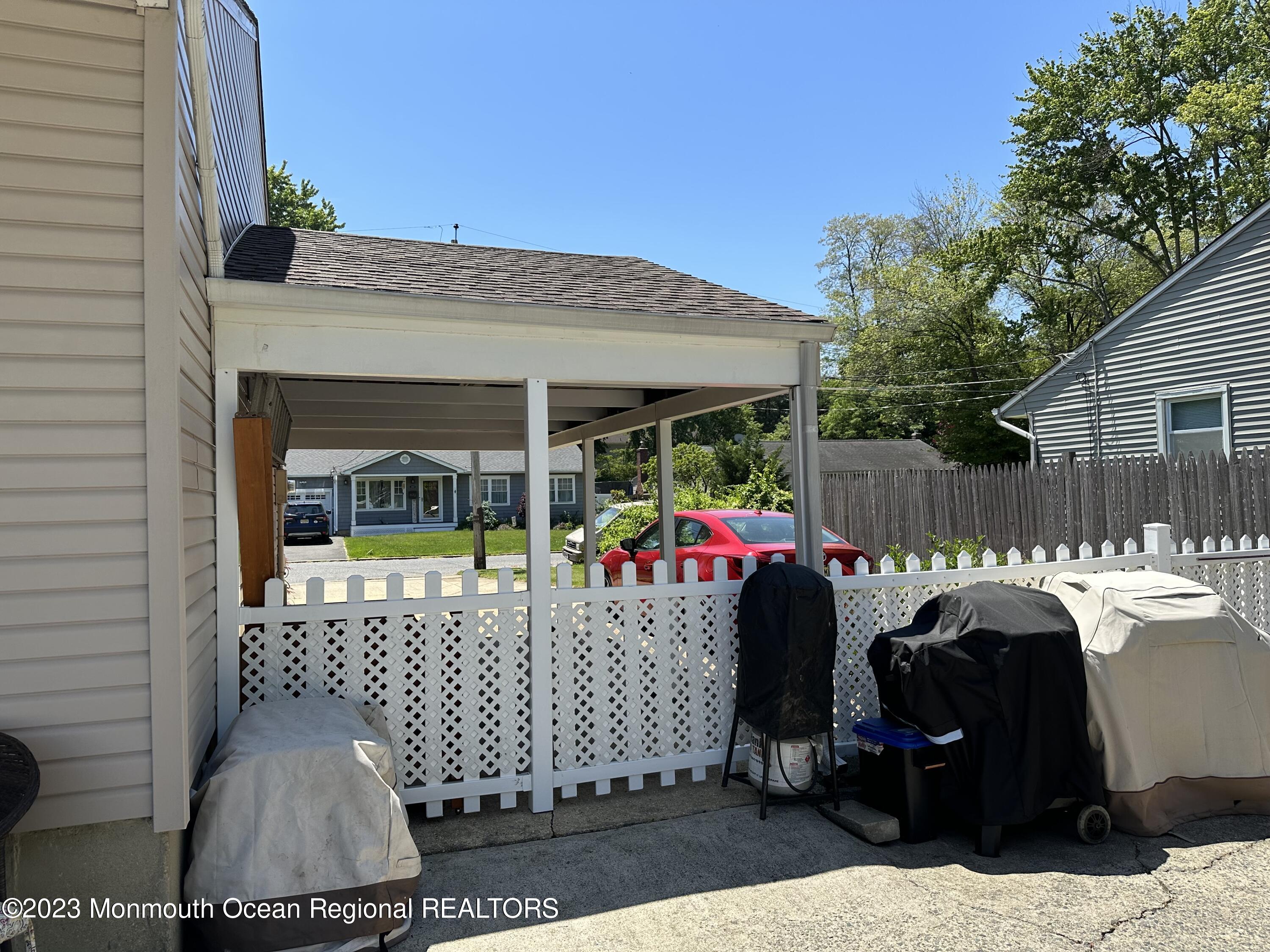 283 Edgemoor Road Belford, NJ 07718 - Photo 30 of 32 Grill aea and carport