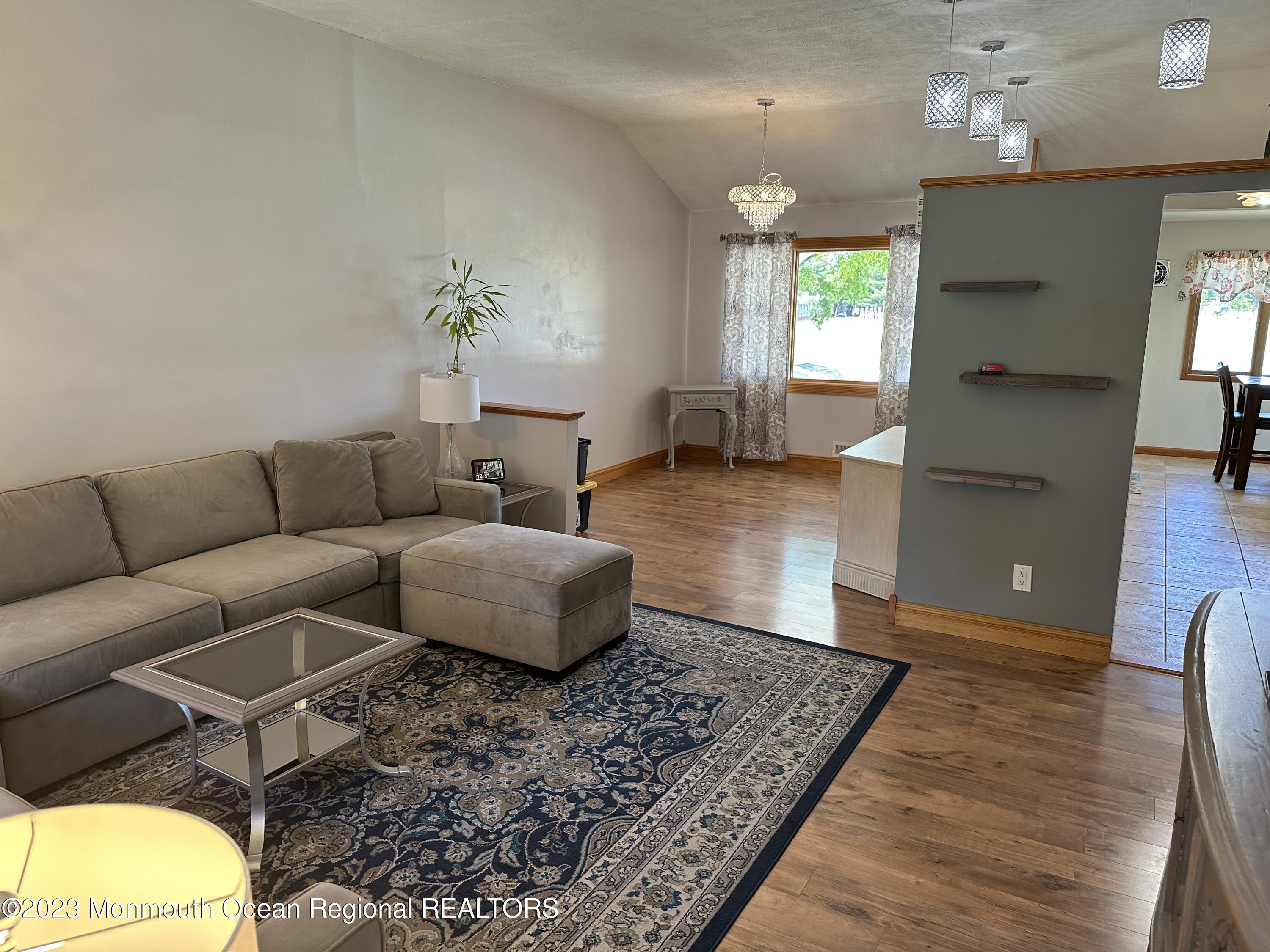283 Edgemoor Road Belford, NJ 07718 - Photo 8 of 32 Living room toward dining room
