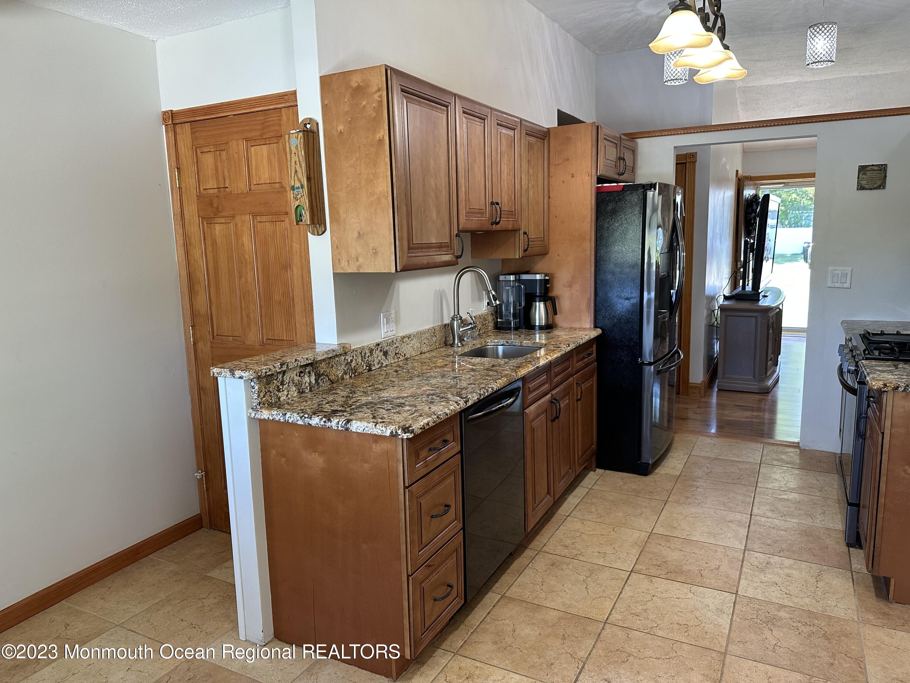 283 Edgemoor Road Belford, NJ 07718 - Photo 9 of 32 Kitchen -dishwasher and SS refrig