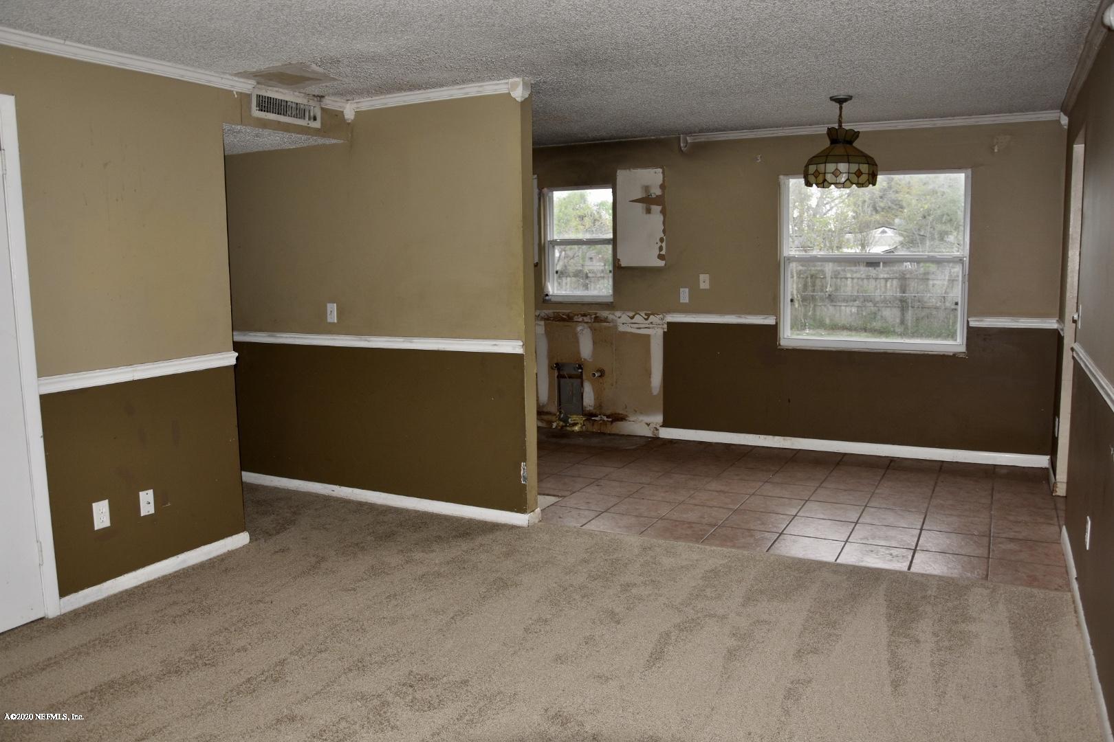 8382 Walden Road Jacksonville, FL 32244 - Photo 5 of 14 Living Room/Dining