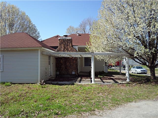 10537 Viola Road Morrison, TN 37357 - Photo 18 of 20 Relaxing back patio is roomy enough for a table and chairs not to mention a plush lounge.