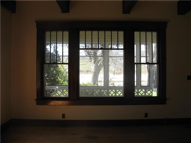 10537 Viola Road Morrison, TN 37357 - Photo 4 of 20 Boasting charming and unusual trio of windows, the gracious Living Room looks out onto the front porch and beyond.