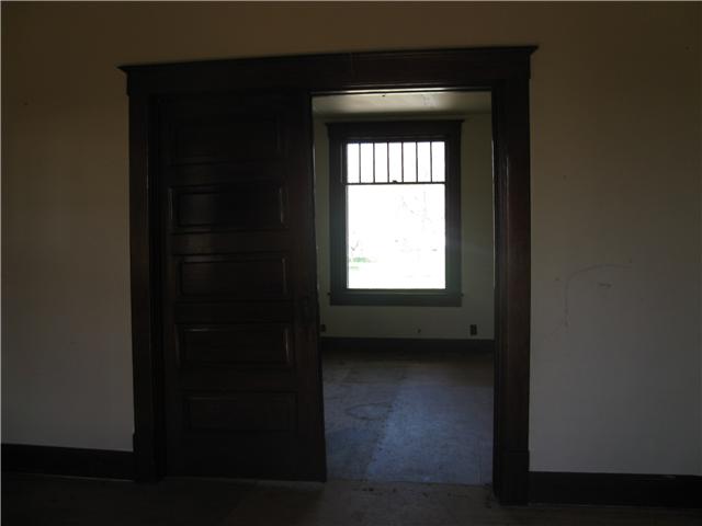 10537 Viola Road Morrison, TN 37357 - Photo 7 of 20 Add privacy to the room by closing the wood pocket doors.