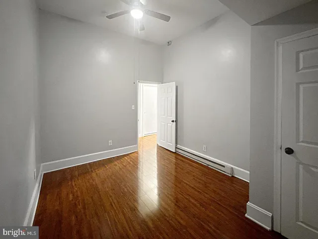 a kitchen with stainless steel appliances a refrigerator and cabinets