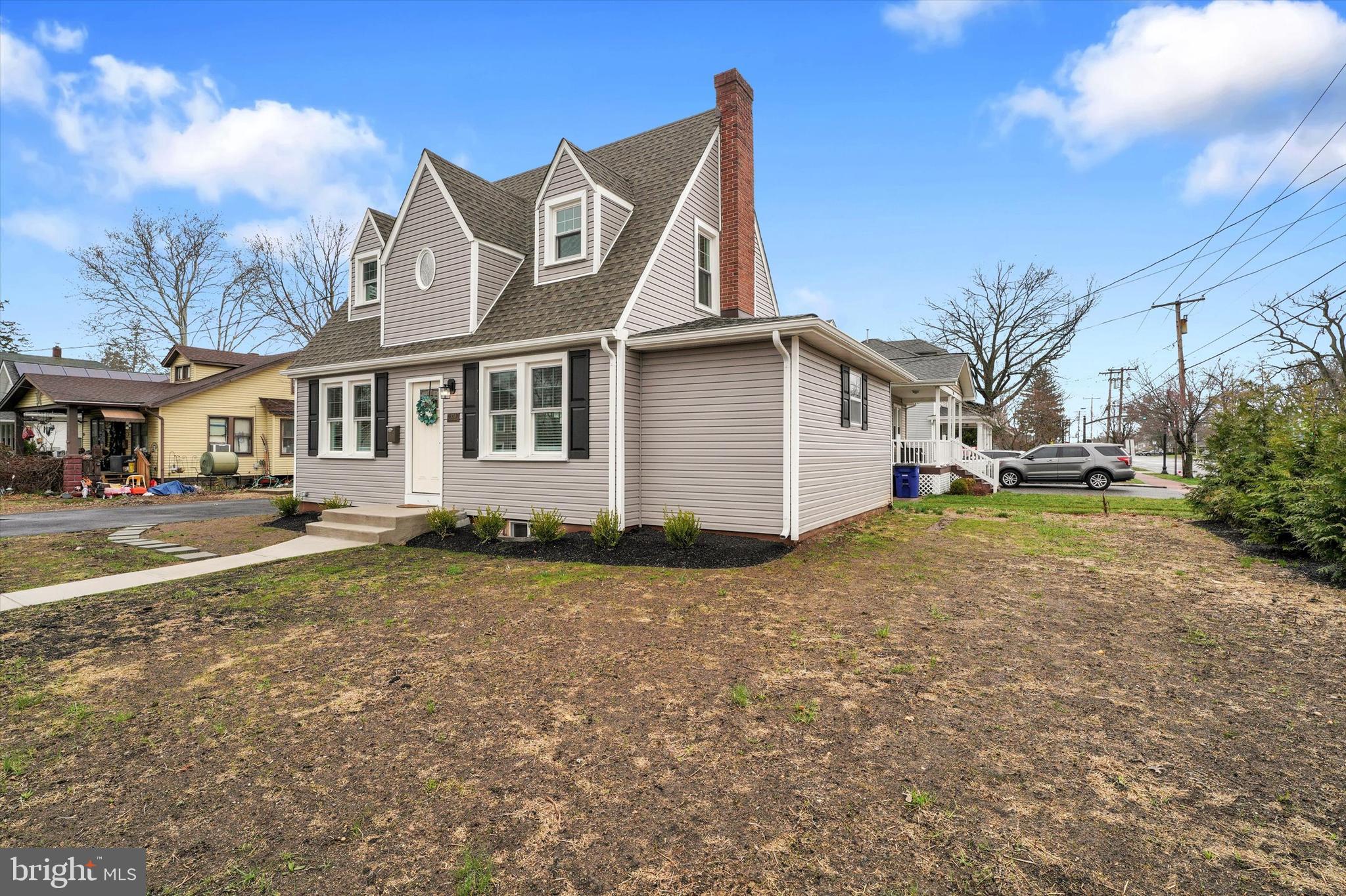 330 Hazel Avenue Delanco, NJ 08075 - Photo 2 of 54 a front view of a house with a yard