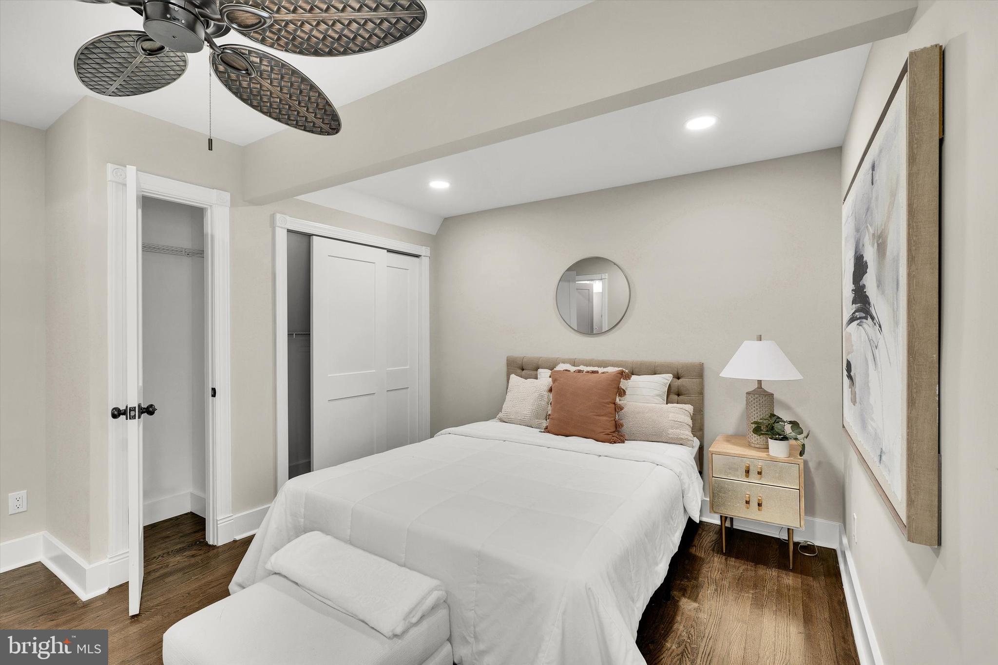 330 Hazel Avenue Delanco, NJ 08075 - Photo 28 of 54 a bedroom with a bed and a chandelier