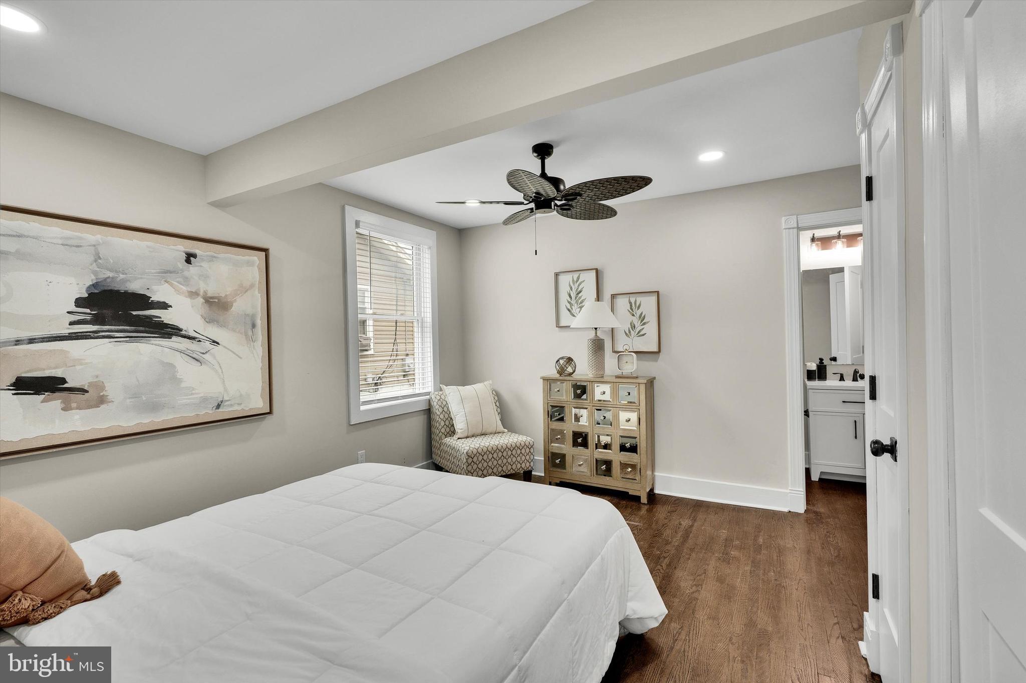 330 Hazel Avenue Delanco, NJ 08075 - Photo 30 of 54 a bedroom with a bed and a chandelier