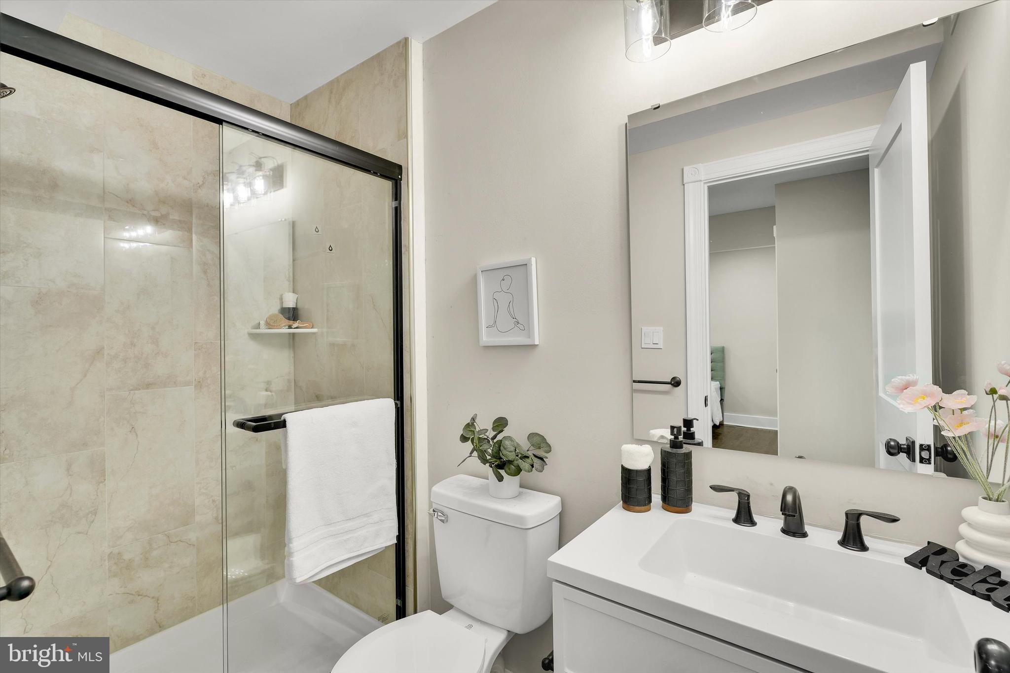 330 Hazel Avenue Delanco, NJ 08075 - Photo 31 of 54 a bathroom with a sink toilet and shower