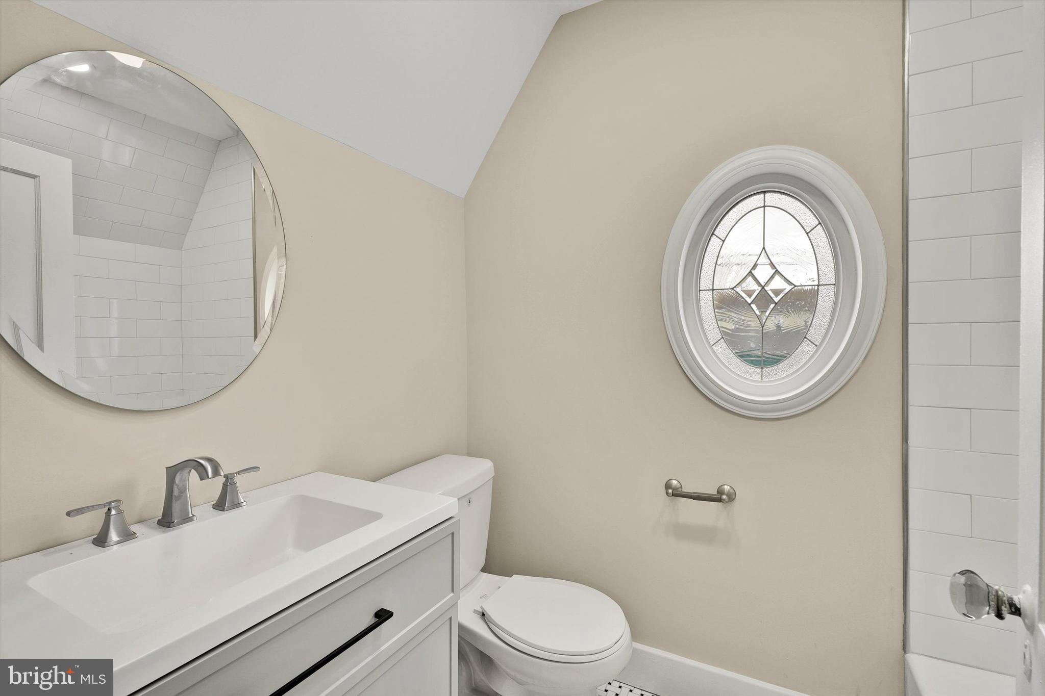 330 Hazel Avenue Delanco, NJ 08075 - Photo 41 of 54 a bathroom with a toilet a sink and a mirror