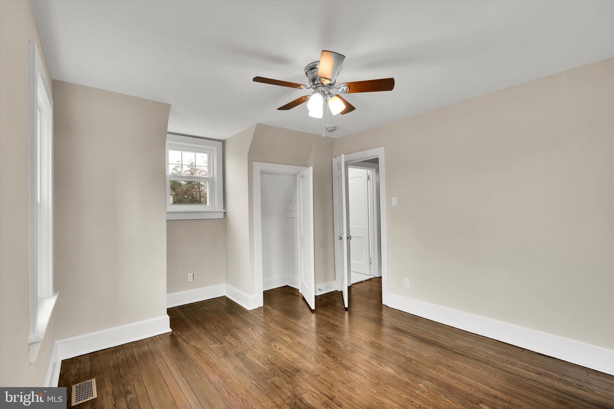 330 Hazel Avenue Delanco, NJ 08075 - Photo 44 of 54 wooden floor in an empty room with a window