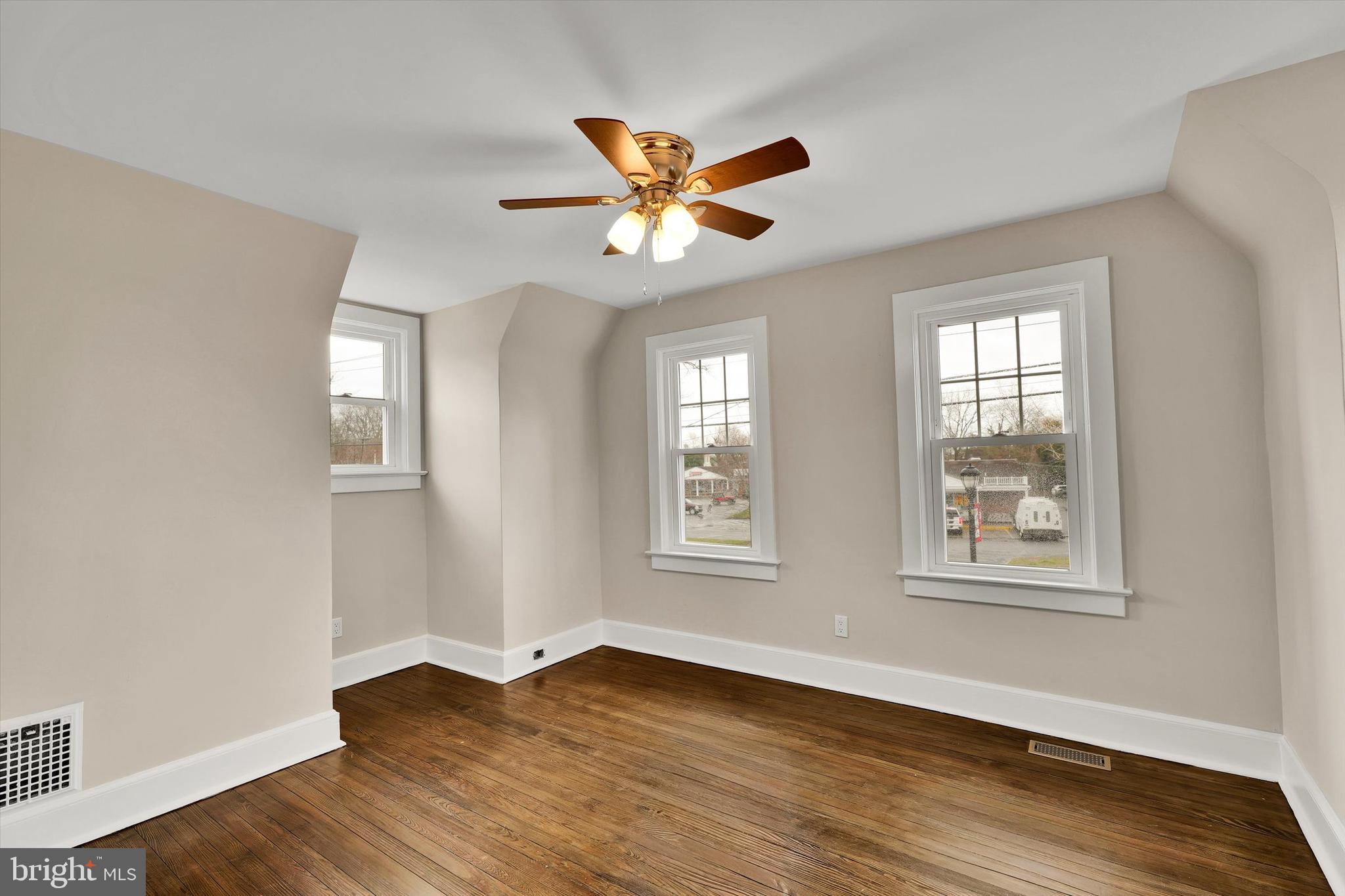 330 Hazel Avenue Delanco, NJ 08075 - Photo 46 of 54 a view of an empty room with window and wooden floor
