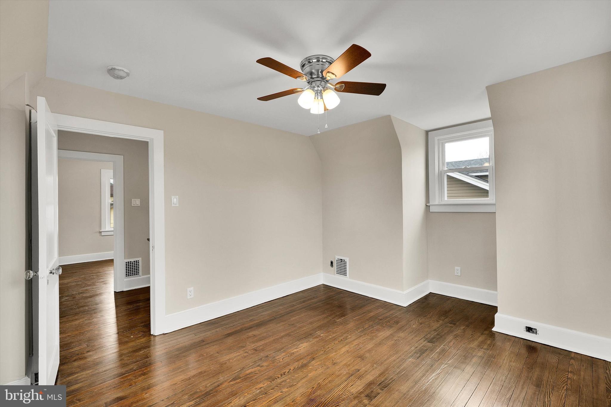 330 Hazel Avenue Delanco, NJ 08075 - Photo 47 of 54 a view of empty room with wooden floor and fan