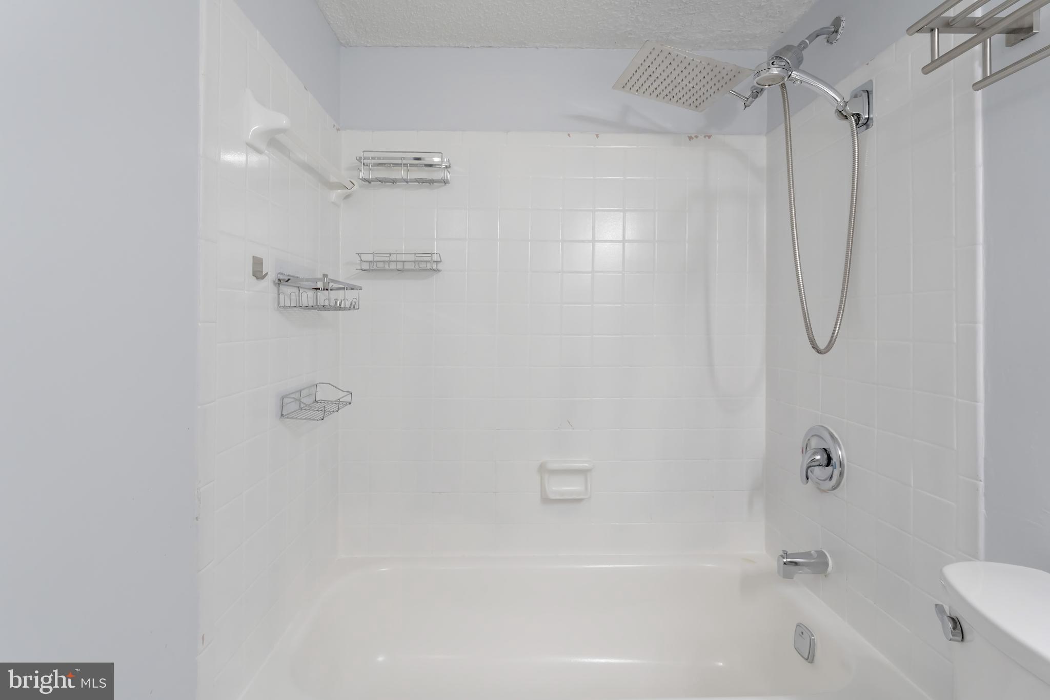 11833 Shire Court, Unit 11B Reston, VA 20191 - Photo 20 of 29 a close view of a bathtub in a bathroom