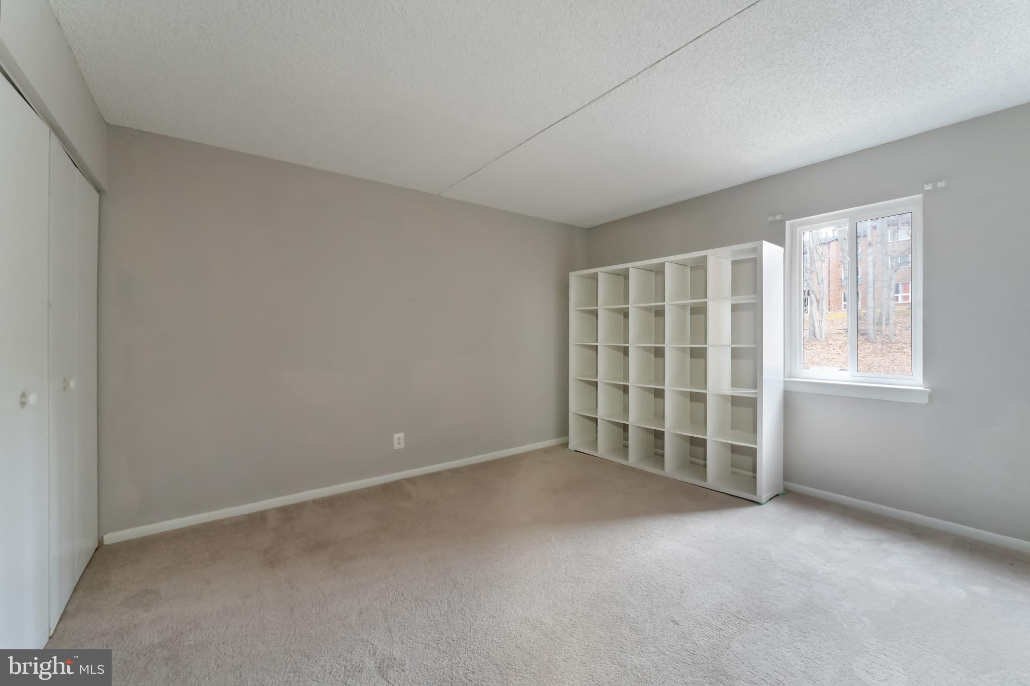 11833 Shire Court, Unit 11B Reston, VA 20191 - Photo 21 of 29 an empty room with windows