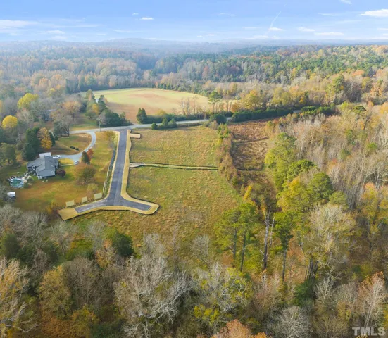 a view of residential houses with outdoor space