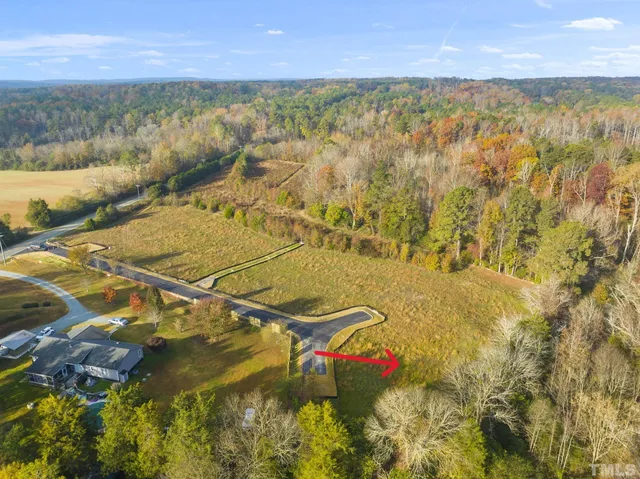 a dirty bathroom with swimming pool and next to a yard