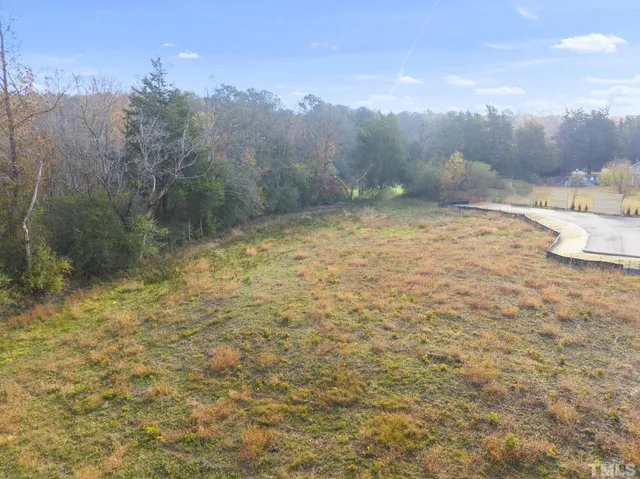 a view of a yard with an outdoor space