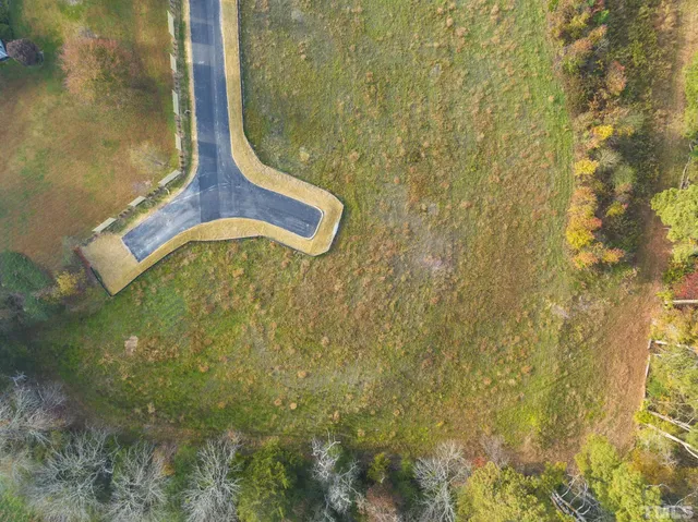 a bathroom with a granite countertop sink and vanity