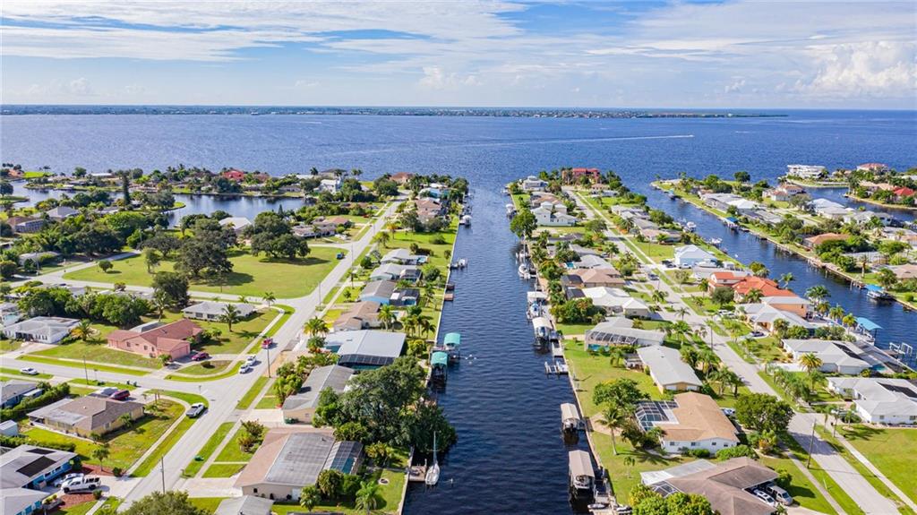 LOOK AT THIS LOCATION! ( house is between sailboat and dock with blue canopy- left side)